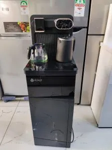 Black and silver Nunix A1C Bottom Load Hot And Cold Water Dispenser
